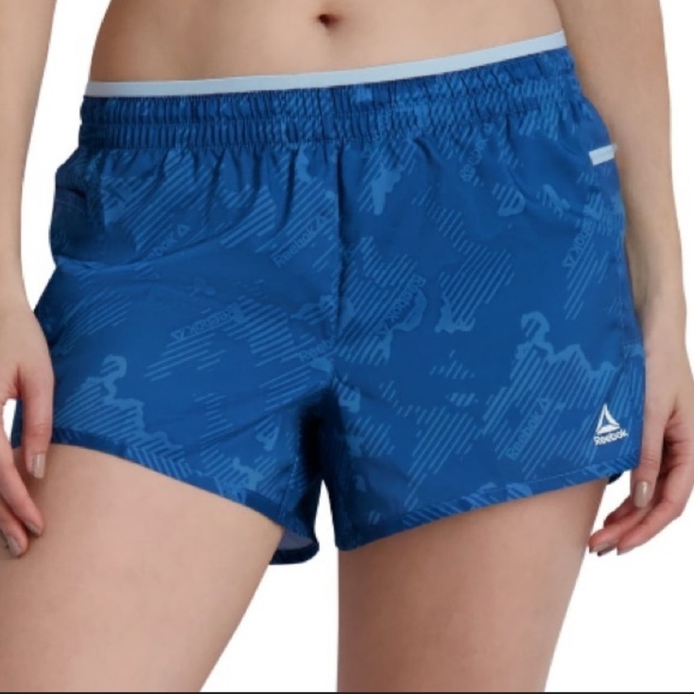 (19) Reebok Navy Patterned Running Shorts